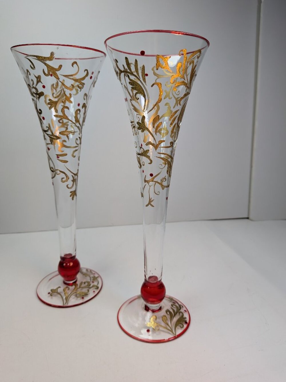 Hand Painted Festive Gold Scroll Red Accents Tall Flute Wine Glasses Pair